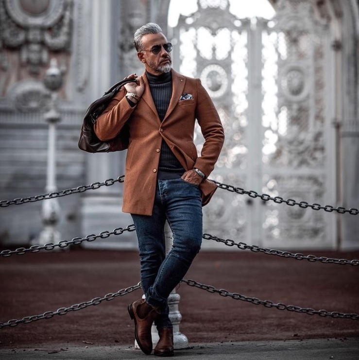 black shirt with brown belt and shoes